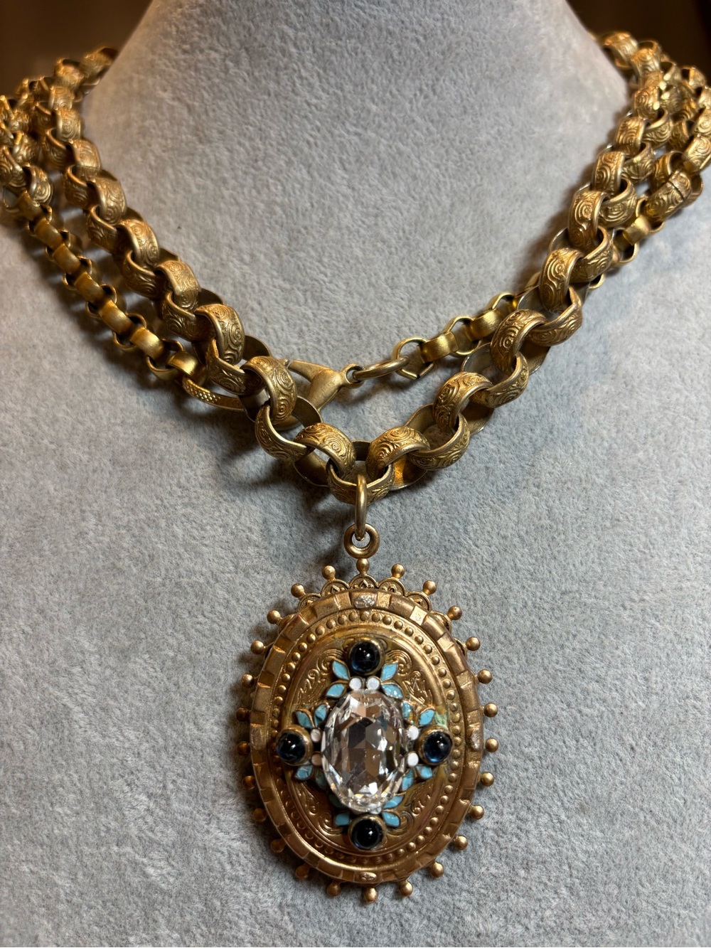 Refurbished vintage Oval Pendant Necklace with Clear Crystal and Blue Accents